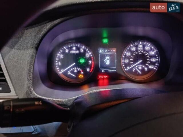 Білий Хендай Туксон, об'ємом двигуна 2 л та пробігом 97 тис. км за 14200 $, фото 13 на Automoto.ua