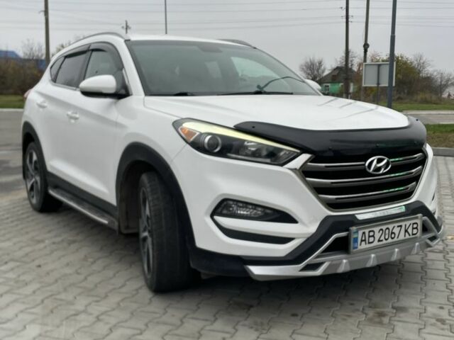 Белый Хендай Туксон, объемом двигателя 1.6 л и пробегом 156 тыс. км за 16000 $, фото 2 на Automoto.ua
