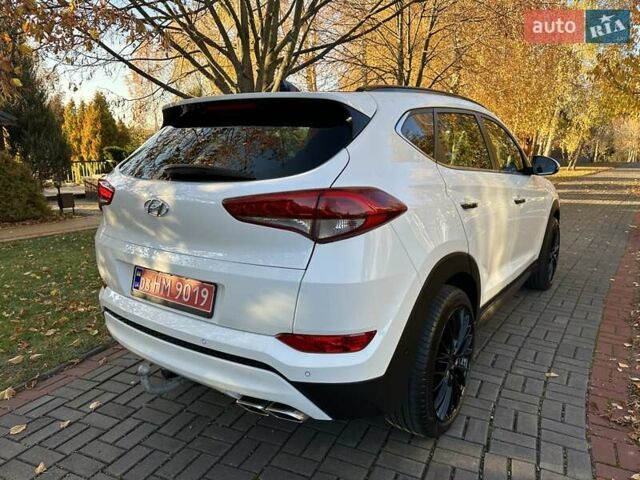 Білий Хендай Туксон, об'ємом двигуна 2 л та пробігом 148 тис. км за 22500 $, фото 11 на Automoto.ua