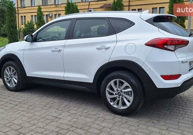 Белый Хендай Туксон, объемом двигателя 2 л и пробегом 221 тыс. км за 16500 $, фото 13 на Automoto.ua