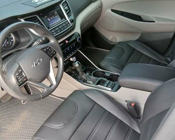 Білий Хендай Туксон, об'ємом двигуна 1.6 л та пробігом 106 тис. км за 16500 $, фото 12 на Automoto.ua
