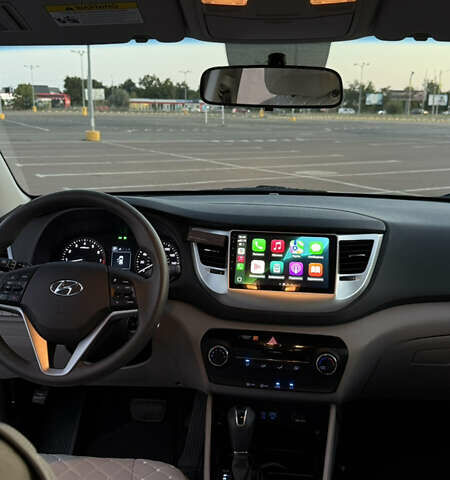 Білий Хендай Туксон, об'ємом двигуна 1.6 л та пробігом 80 тис. км за 16500 $, фото 12 на Automoto.ua