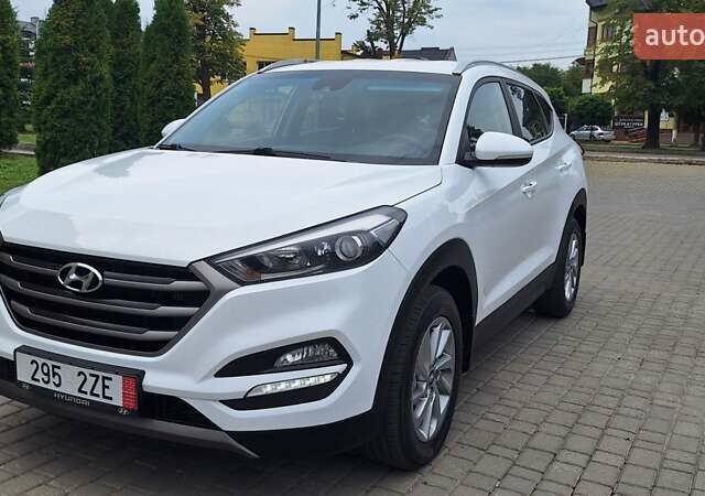 Белый Хендай Туксон, объемом двигателя 2 л и пробегом 221 тыс. км за 16500 $, фото 17 на Automoto.ua