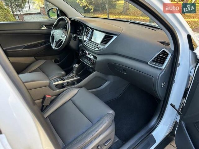 Білий Хендай Туксон, об'ємом двигуна 2 л та пробігом 148 тис. км за 22500 $, фото 53 на Automoto.ua