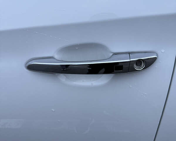 Белый Хендай Туксон, объемом двигателя 2 л и пробегом 152 тыс. км за 18500 $, фото 9 на Automoto.ua