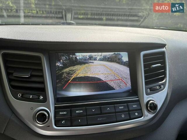 Белый Хендай Туксон, объемом двигателя 1.6 л и пробегом 180 тыс. км за 16500 $, фото 20 на Automoto.ua