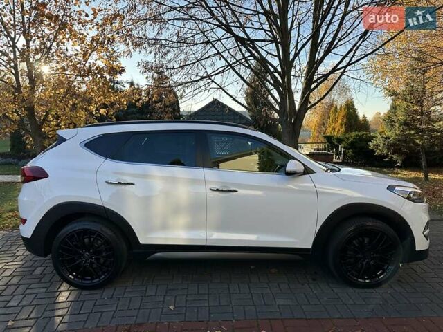Білий Хендай Туксон, об'ємом двигуна 2 л та пробігом 148 тис. км за 22500 $, фото 9 на Automoto.ua