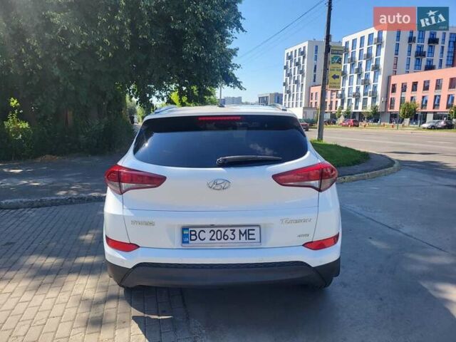 Білий Хендай Туксон, об'ємом двигуна 2 л та пробігом 185 тис. км за 13700 $, фото 4 на Automoto.ua