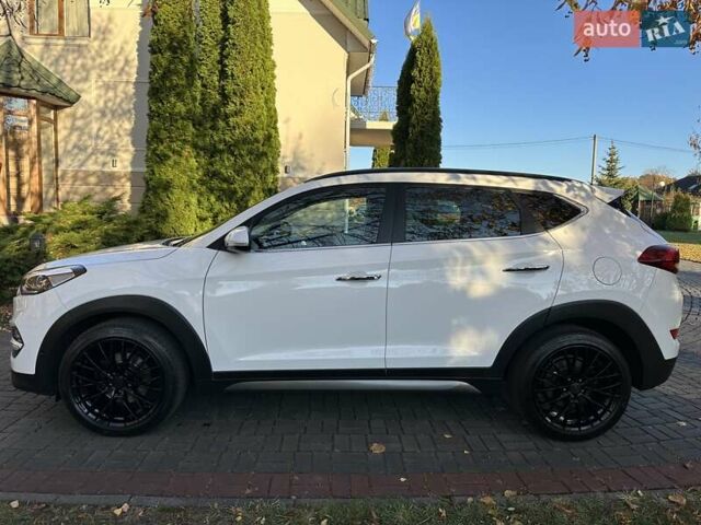 Білий Хендай Туксон, об'ємом двигуна 2 л та пробігом 148 тис. км за 22500 $, фото 4 на Automoto.ua