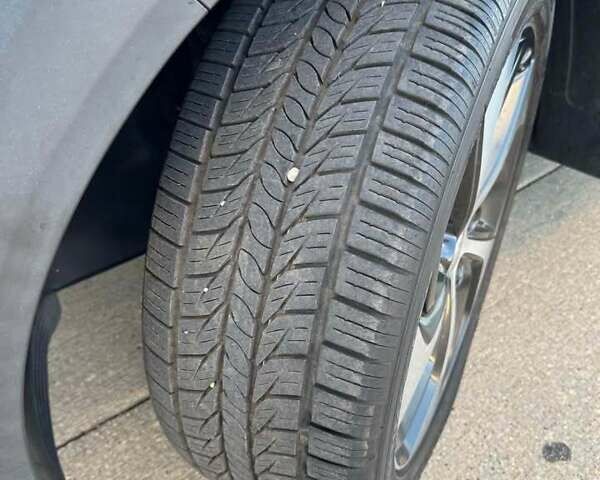 Белый Хендай Туксон, объемом двигателя 2 л и пробегом 110 тыс. км за 14000 $, фото 8 на Automoto.ua