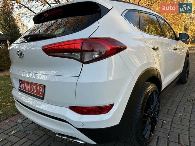 Білий Хендай Туксон, об'ємом двигуна 2 л та пробігом 148 тис. км за 22500 $, фото 81 на Automoto.ua
