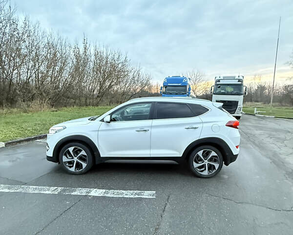 Белый Хендай Туксон, объемом двигателя 2 л и пробегом 152 тыс. км за 18500 $, фото 7 на Automoto.ua
