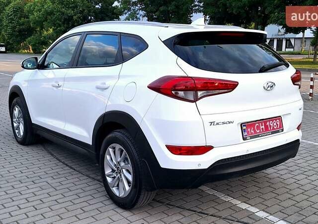 Белый Хендай Туксон, объемом двигателя 2 л и пробегом 221 тыс. км за 15999 $, фото 8 на Automoto.ua