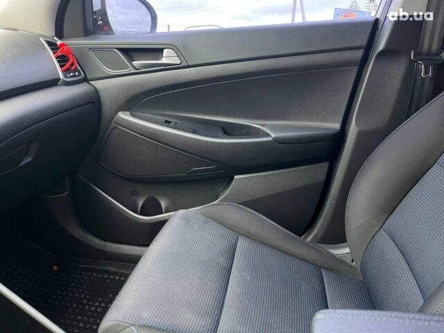 Белый Хендай Туксон, объемом двигателя 2 л и пробегом 147 тыс. км за 18740 $, фото 26 на Automoto.ua