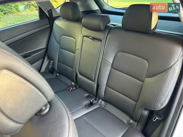 Білий Хендай Туксон, об'ємом двигуна 2 л та пробігом 148 тис. км за 22500 $, фото 49 на Automoto.ua
