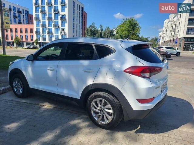 Білий Хендай Туксон, об'ємом двигуна 2 л та пробігом 185 тис. км за 13700 $, фото 5 на Automoto.ua