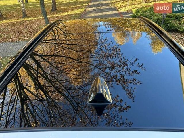 Білий Хендай Туксон, об'ємом двигуна 2 л та пробігом 148 тис. км за 22500 $, фото 13 на Automoto.ua