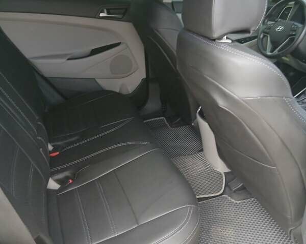 Білий Хендай Туксон, об'ємом двигуна 1.6 л та пробігом 106 тис. км за 16500 $, фото 14 на Automoto.ua