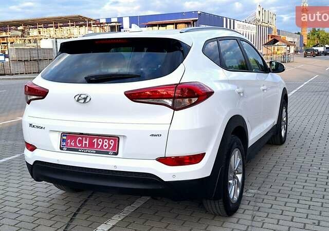 Белый Хендай Туксон, объемом двигателя 2 л и пробегом 221 тыс. км за 15999 $, фото 6 на Automoto.ua