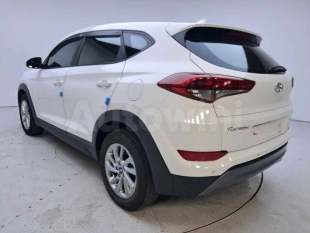 Белый Хендай Туксон, объемом двигателя 2 л и пробегом 157 тыс. км за 15500 $, фото 6 на Automoto.ua