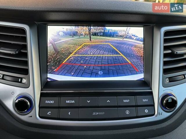 Білий Хендай Туксон, об'ємом двигуна 2 л та пробігом 148 тис. км за 22500 $, фото 25 на Automoto.ua