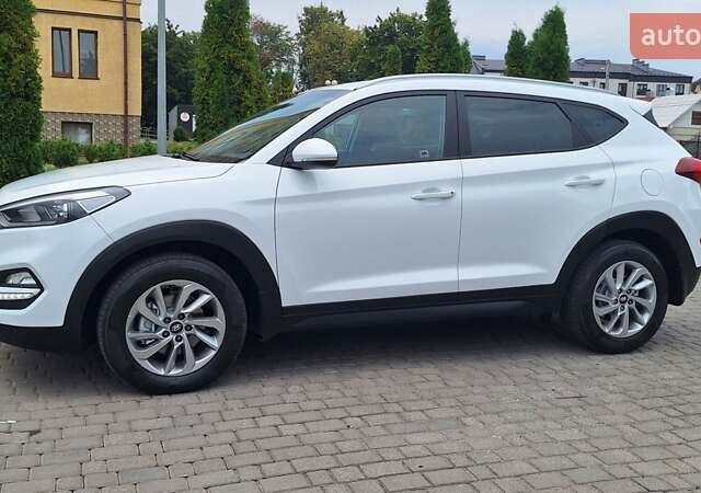 Белый Хендай Туксон, объемом двигателя 2 л и пробегом 221 тыс. км за 16500 $, фото 16 на Automoto.ua