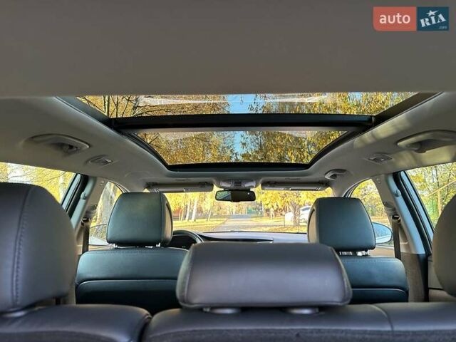 Білий Хендай Туксон, об'ємом двигуна 2 л та пробігом 148 тис. км за 22500 $, фото 74 на Automoto.ua