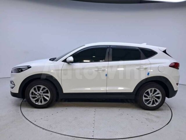 Белый Хендай Туксон, объемом двигателя 2 л и пробегом 157 тыс. км за 15500 $, фото 5 на Automoto.ua