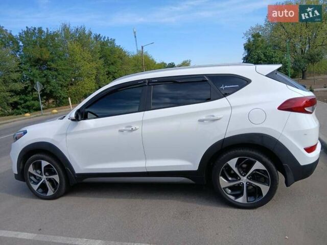 Білий Хендай Туксон, об'ємом двигуна 1.6 л та пробігом 106 тис. км за 16500 $, фото 7 на Automoto.ua