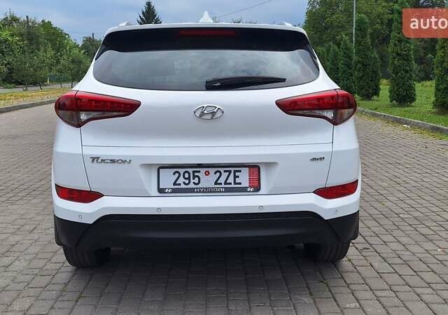 Белый Хендай Туксон, объемом двигателя 2 л и пробегом 221 тыс. км за 16500 $, фото 10 на Automoto.ua