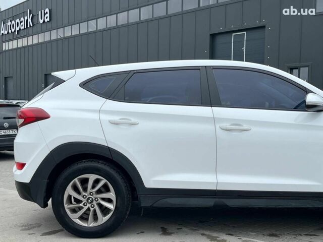Белый Хендай Туксон, объемом двигателя 2 л и пробегом 147 тыс. км за 18740 $, фото 9 на Automoto.ua
