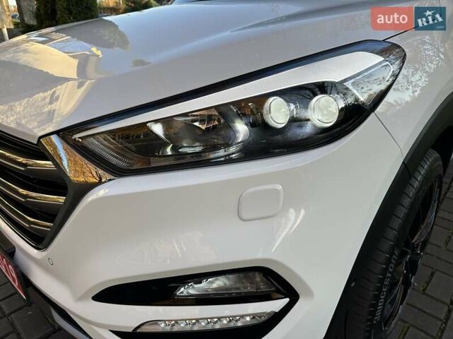 Білий Хендай Туксон, об'ємом двигуна 2 л та пробігом 148 тис. км за 22500 $, фото 78 на Automoto.ua