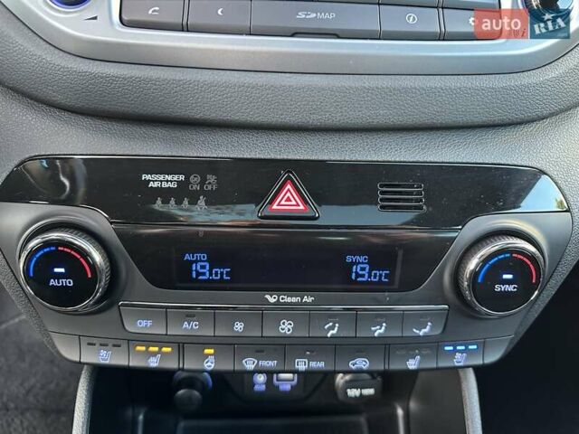 Білий Хендай Туксон, об'ємом двигуна 2 л та пробігом 148 тис. км за 22500 $, фото 26 на Automoto.ua