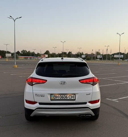 Білий Хендай Туксон, об'ємом двигуна 1.6 л та пробігом 80 тис. км за 16500 $, фото 5 на Automoto.ua