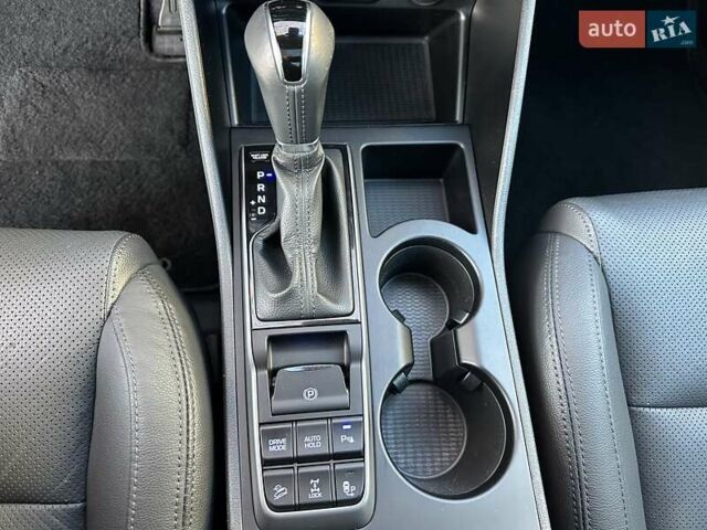 Білий Хендай Туксон, об'ємом двигуна 2 л та пробігом 148 тис. км за 22500 $, фото 28 на Automoto.ua