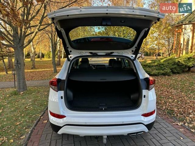 Білий Хендай Туксон, об'ємом двигуна 2 л та пробігом 148 тис. км за 22500 $, фото 69 на Automoto.ua