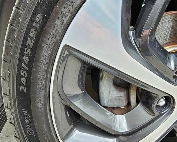 Білий Хендай Туксон, об'ємом двигуна 2 л та пробігом 80 тис. км за 20000 $, фото 13 на Automoto.ua