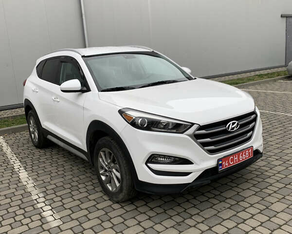 Белый Хендай Туксон, объемом двигателя 2 л и пробегом 167 тыс. км за 15800 $, фото 6 на Automoto.ua
