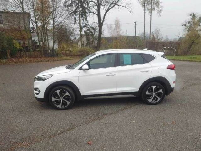 Білий Хендай Туксон, об'ємом двигуна 1.6 л та пробігом 85 тис. км за 10600 $, фото 3 на Automoto.ua