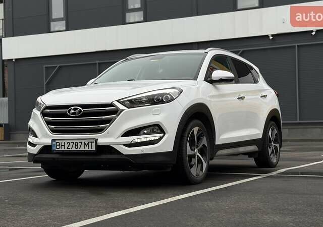 Белый Хендай Туксон, объемом двигателя 2 л и пробегом 82 тыс. км за 19000 $, фото 8 на Automoto.ua