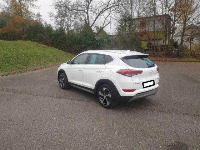 Білий Хендай Туксон, об'ємом двигуна 1.6 л та пробігом 85 тис. км за 10600 $, фото 4 на Automoto.ua