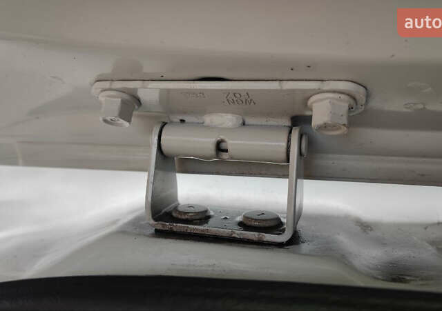 Белый Хендай Туксон, объемом двигателя 2 л и пробегом 147 тыс. км за 17500 $, фото 31 на Automoto.ua