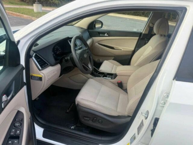 Белый Хендай Туксон, объемом двигателя 2 л и пробегом 60 тыс. км за 12200 $, фото 9 на Automoto.ua