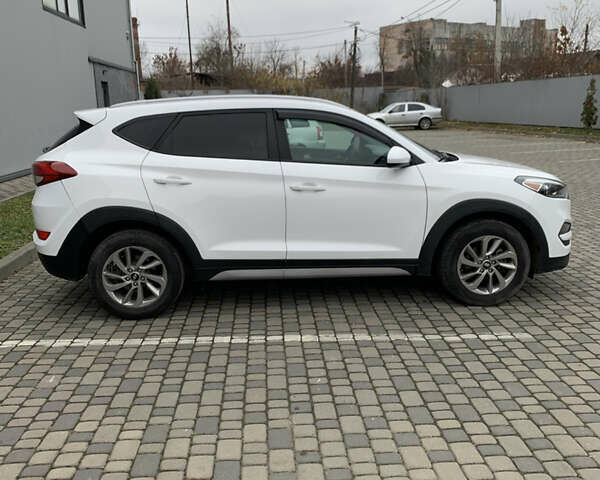 Белый Хендай Туксон, объемом двигателя 2 л и пробегом 167 тыс. км за 15800 $, фото 5 на Automoto.ua