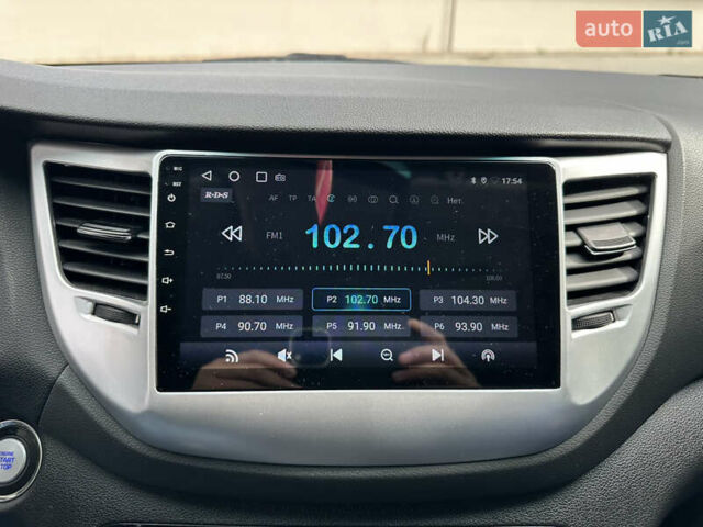 Белый Хендай Туксон, объемом двигателя 2 л и пробегом 211 тыс. км за 17200 $, фото 26 на Automoto.ua