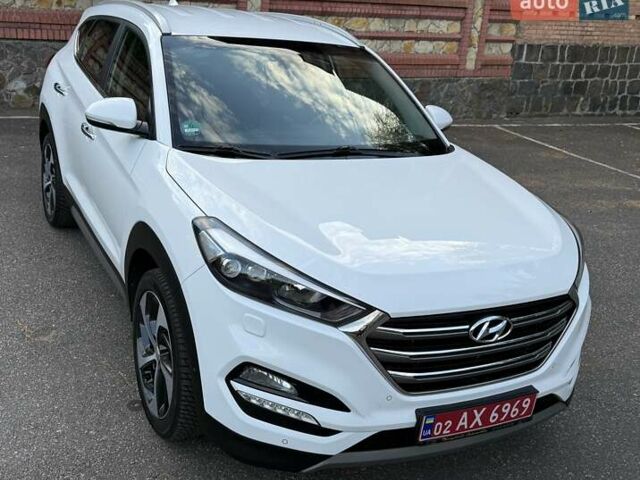 Белый Хендай Туксон, объемом двигателя 2 л и пробегом 149 тыс. км за 20990 $, фото 15 на Automoto.ua