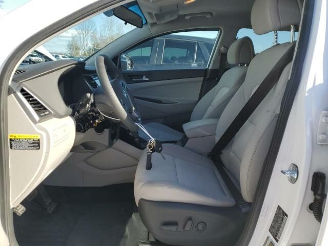 Білий Хендай Туксон, об'ємом двигуна 2 л та пробігом 167 тис. км за 11900 $, фото 6 на Automoto.ua