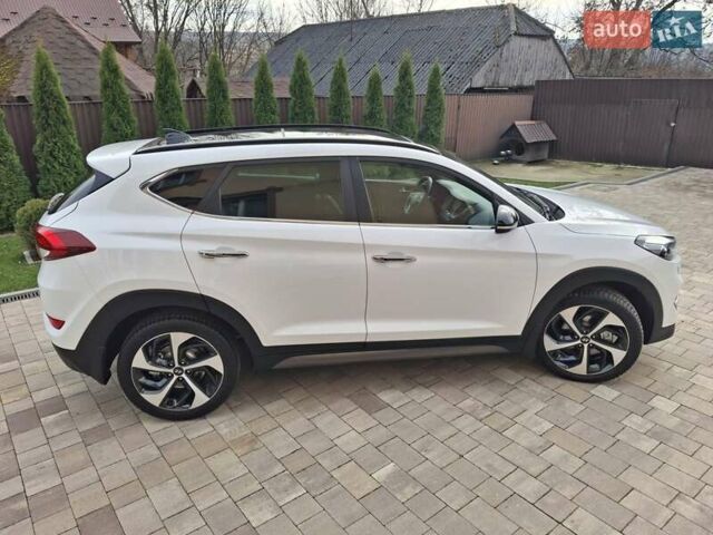 Белый Хендай Туксон, объемом двигателя 2 л и пробегом 203 тыс. км за 18700 $, фото 24 на Automoto.ua