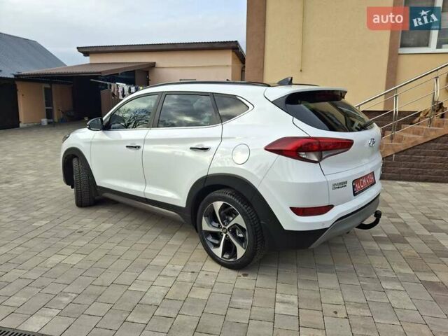 Белый Хендай Туксон, объемом двигателя 2 л и пробегом 203 тыс. км за 18700 $, фото 18 на Automoto.ua