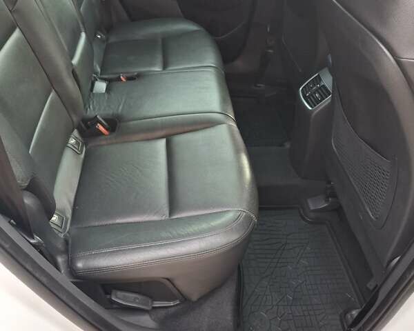 Белый Хендай Туксон, объемом двигателя 2 л и пробегом 203 тыс. км за 18700 $, фото 4 на Automoto.ua